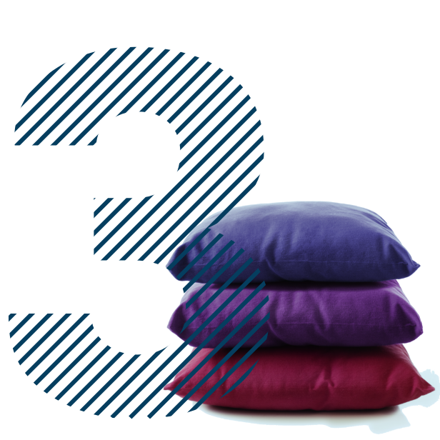 Повдигане на краката за подобряване на кръвообращението, представено с купчина от 3 възглавници